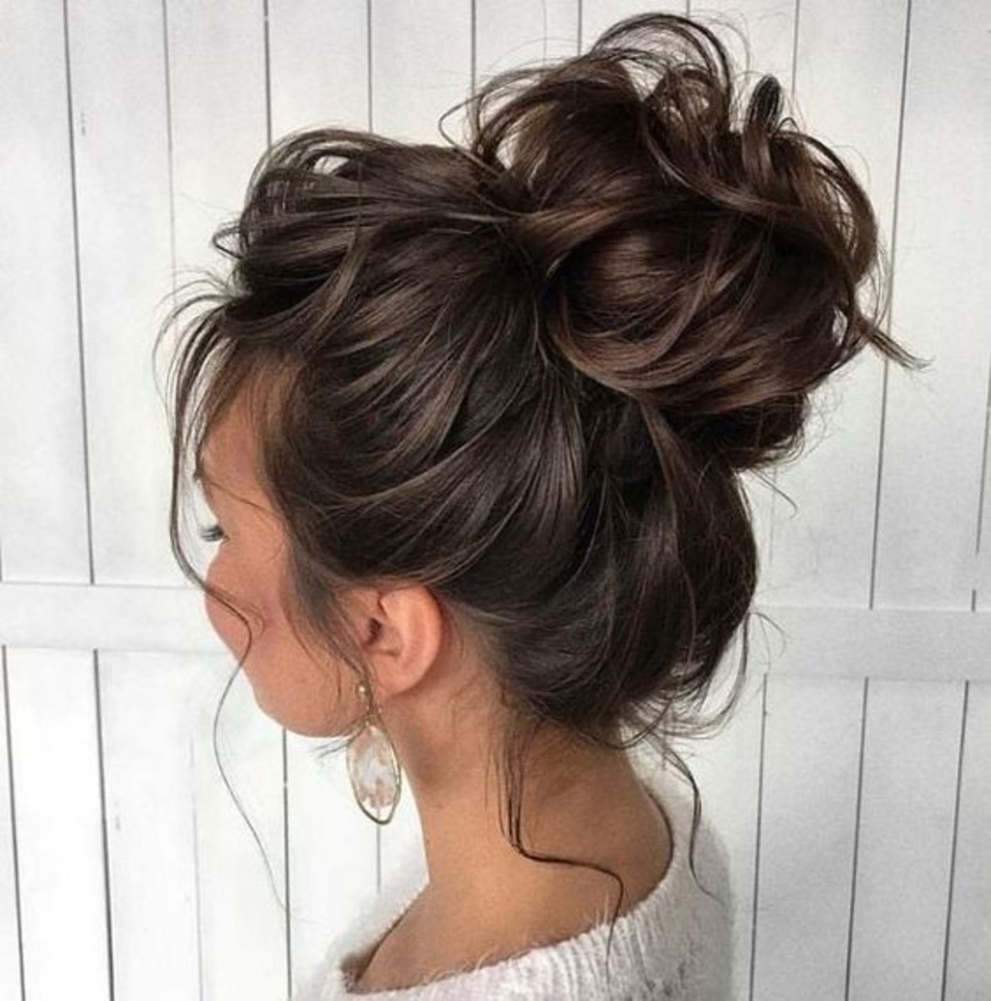 messy bun pelo rizado