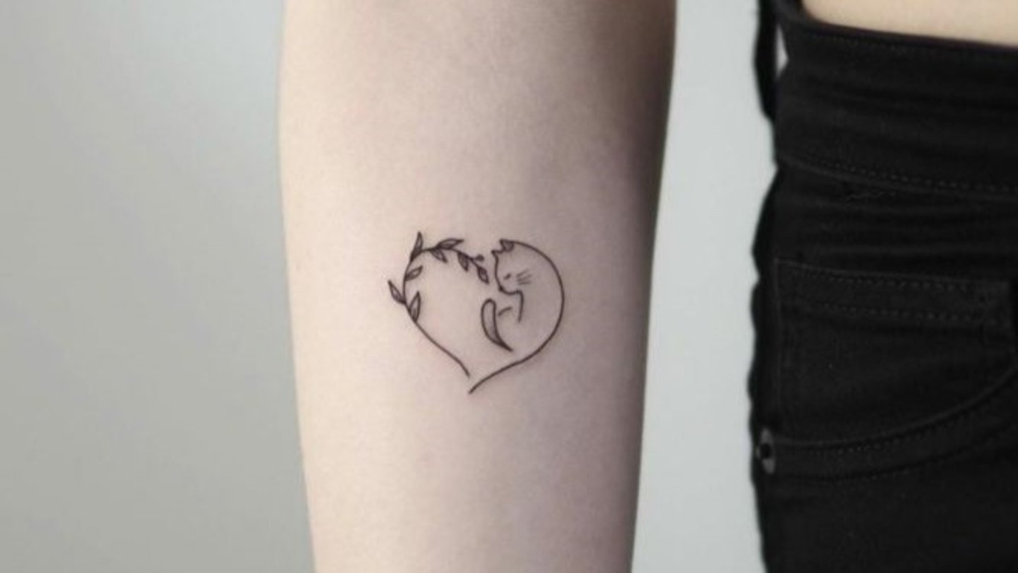 corazon y animales tatuaje