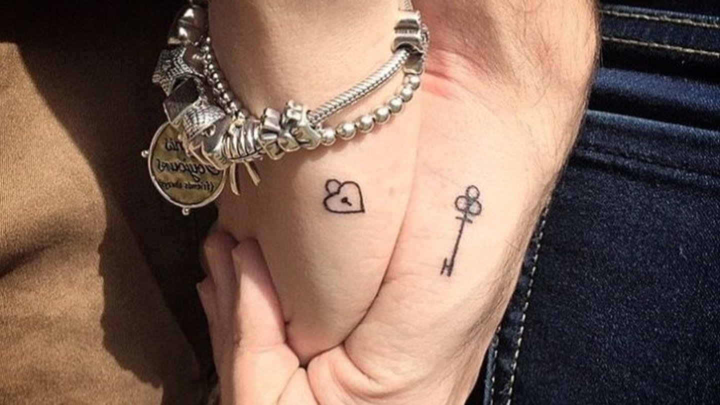 Llave y cerradura tatuaje pareja