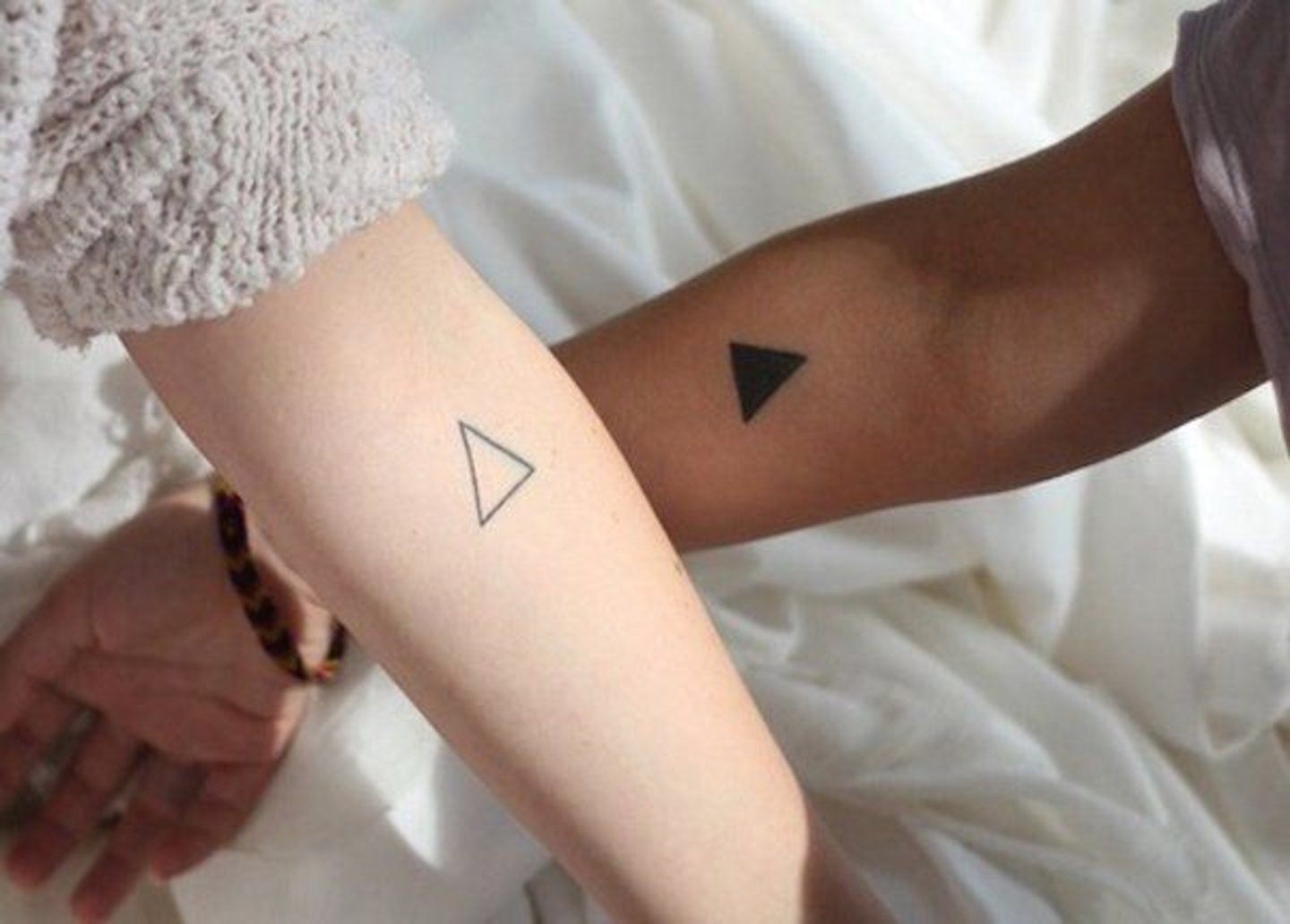 Tatuaje de triangulos