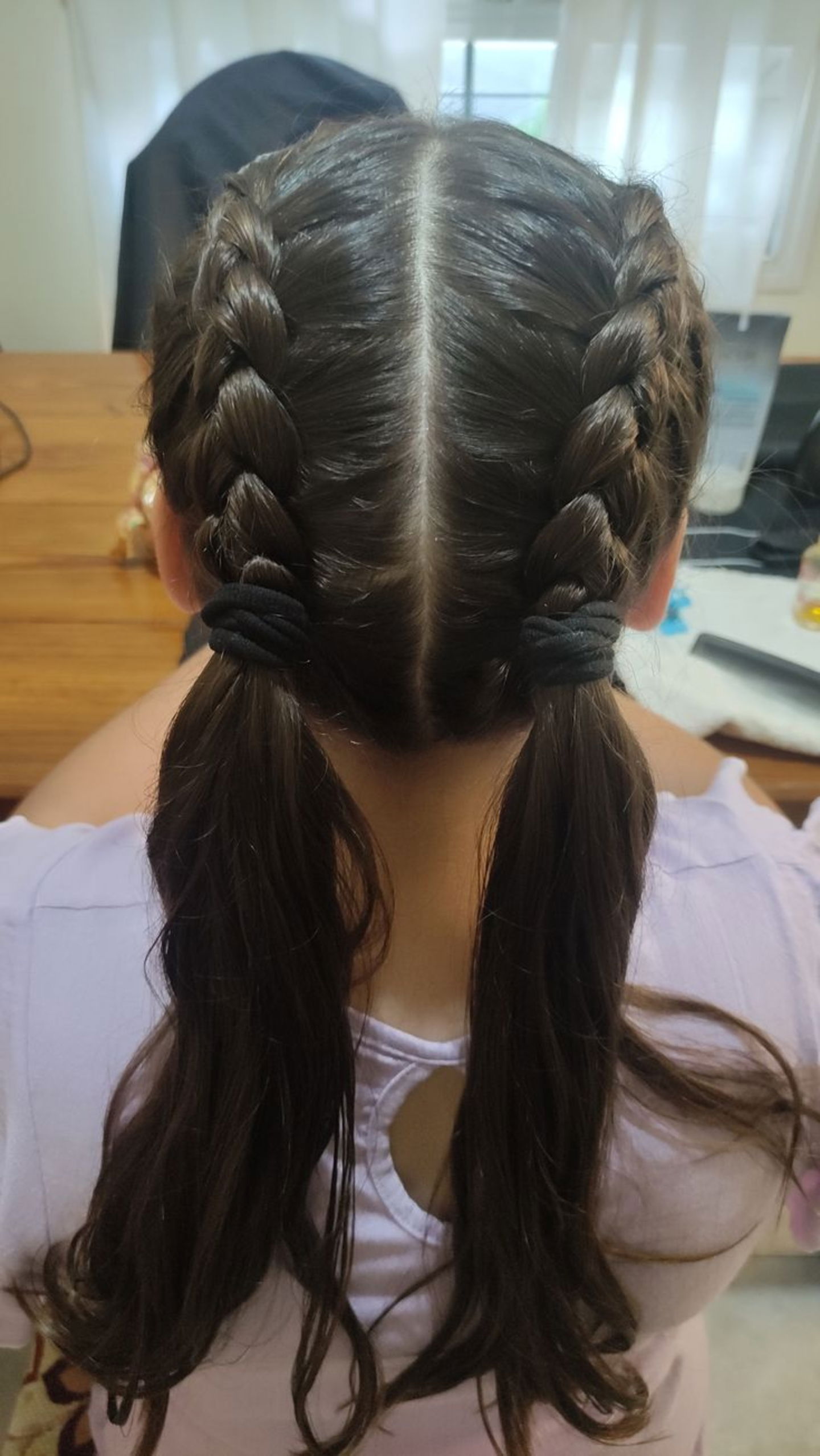 Trenzas de raíz con coleta