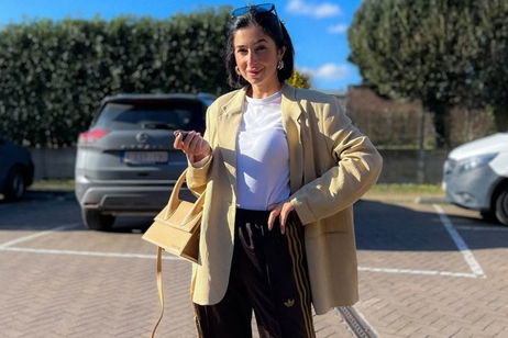 Los pantalones más icónicos de adidas salen del gimnasio y se mezclan con prendas de sastrería